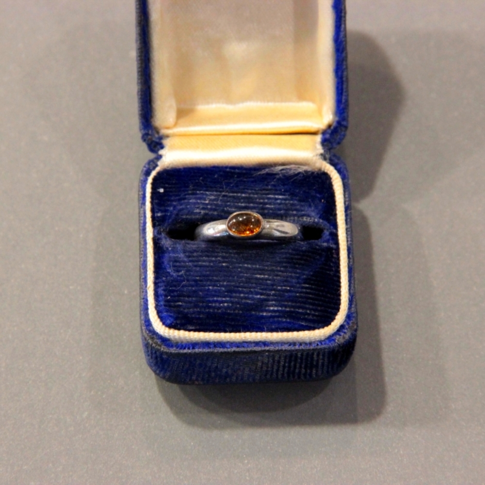 Amber and silver ring